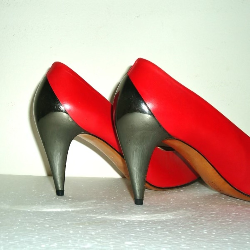 Vintage Red leather heels/pumps with leather soles and chrome/gunmetal heels.